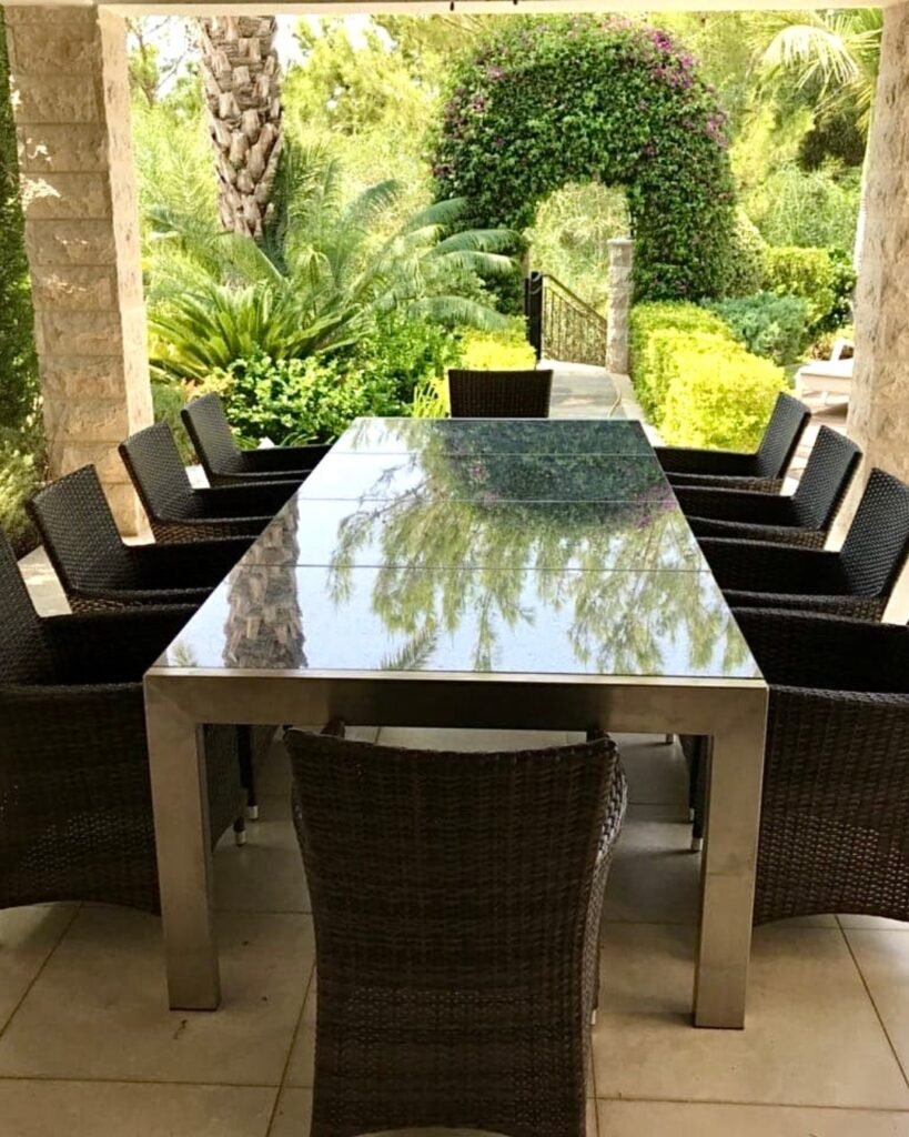 Custom outdoor dining table made by Artifex for a Cyprus terrace