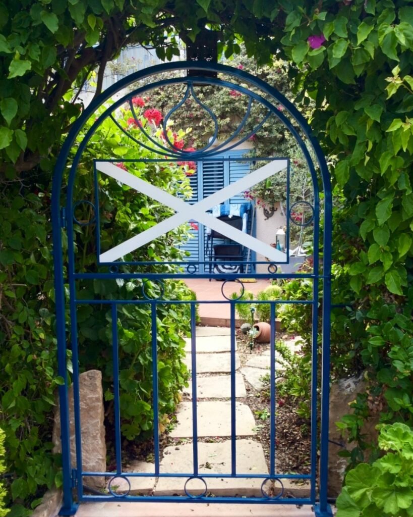 Decorative blue metal garden gate custom made by Artifex