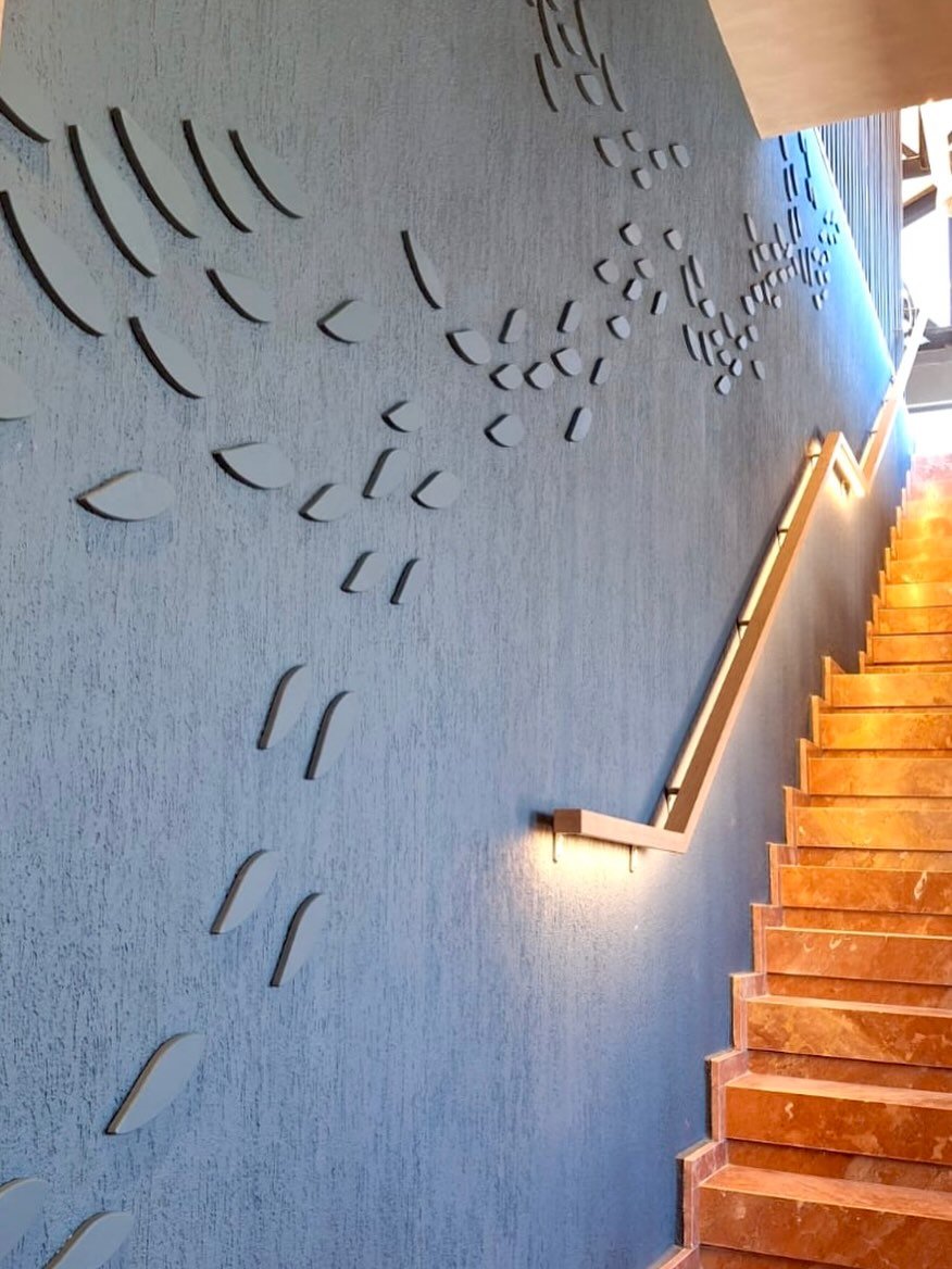 Bespoke metal wall details and handrail for the Ocean Basket project by Artifex