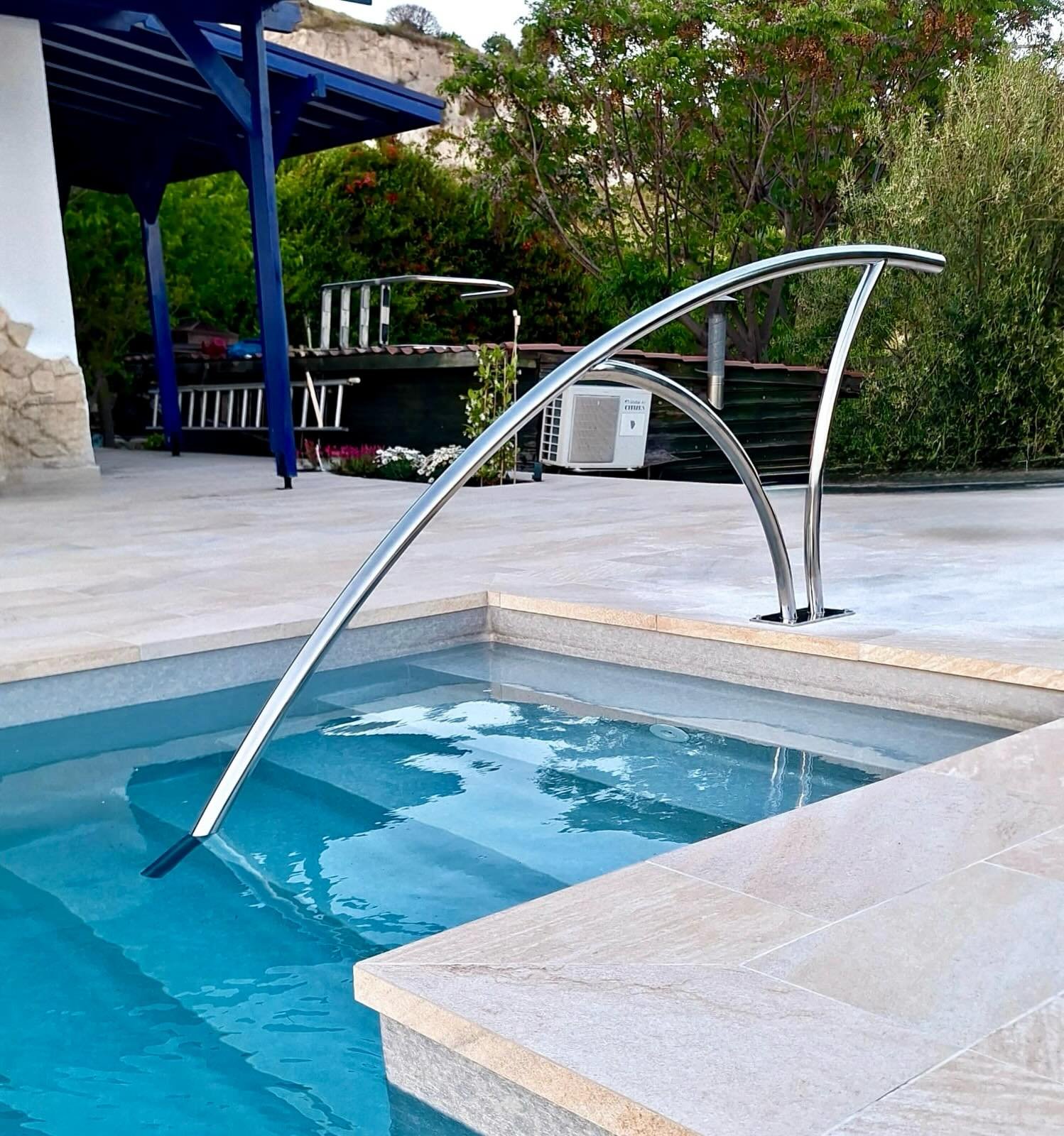 Handcrafted sculptural stainless-steel pool shower by Artifex